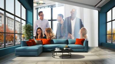 Group of executives gathered in conference room Wall mural