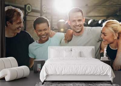 Laughing group of diverse friends standing together in a gym Wall mural