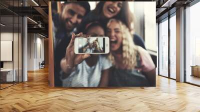 Smiling friends taking selfies with a smartphone on the bus Wall mural