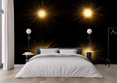 Shining golden stars isolated on black background. The star burst with brilliance. Glow effect. Wall mural