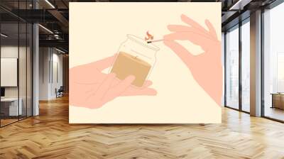 Hands holding scented candle with clear glass and match with fire to light wick. Human fingers hold wooden stick and aromatic candle jar for home spa and aromatherapy cartoon vector illustration Wall mural