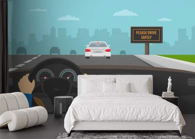 Hands driving a car on the highway. Drive safely warning billboard. Flat vector illustration. Wall mural