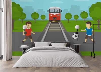 railroad safety rules and tips. do not play on or near railway tracks . male little kids are playing Wall mural