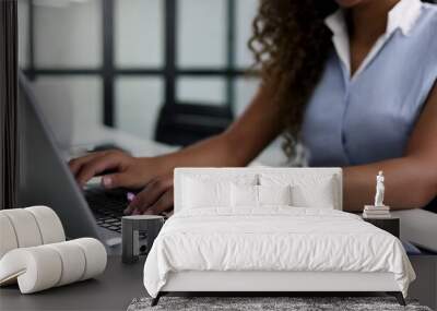 Woman working on laptop, inside home Wall mural