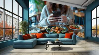 A young woman doing food review with her phone Wall mural