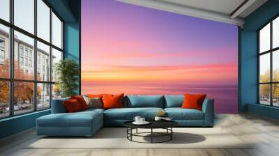 early morning light sky before sunrise soft purple pink and orange light on the horizon empty natural sky with colorful pastel tone colors for background vivid colors in modern mood Wall mural