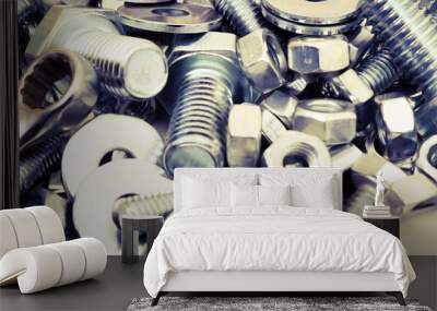 Abstract industrial background. Bolts and nuts. Many metalware. Wall mural