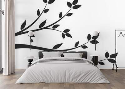 Silhouette of a branch with leaves. Young flowering tree. Sapling. Wall mural