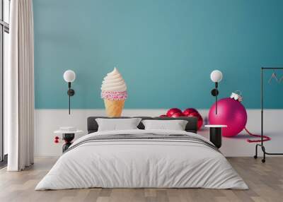 Christmas decoration bauble in ice cream cone. New Year minimal concept. Wall mural