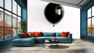 Halloween concept. One black balloon in girl's hand. Flat lay, top view. Wall mural