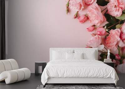 Pink rose flowers bouquet on pink background. Flat lay, top view minimal floral composition. Wall mural