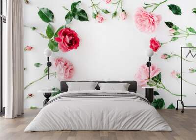 round frame wreath pattern with roses, pink flower buds, branches and leaves isolated on white backg Wall mural