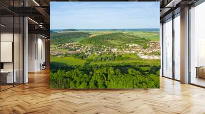 A city in the middle of the countryside in Europe, in France, in Burgundy, in Nievre, in Varzy, towards Clamecy, in Spring, on a sunny day. Wall mural