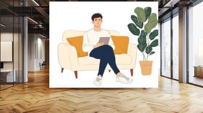 Minimalist illustration of a man sitting on a couch, holding a tablet, with a potted plant beside him, relaxed, modern lifestyle Wall mural