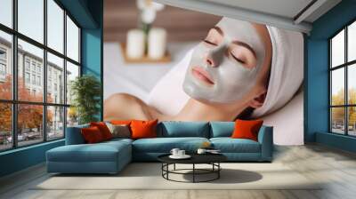 Young beautiful lady doing facial mask, relaxing Wall mural