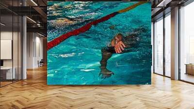 Athletic swimmer in action 2 Wall mural