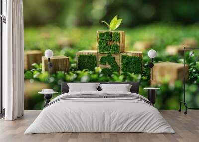 A small green plant growing from wooden blocks with the letters ESG spelled out on them. The blocks are surrounded by green grass, Wall mural