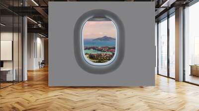 Panorama of the island of Mahe in the plane window. Tropical Seychelles in airplane window Wall mural