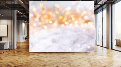 Abstract winter background with snow and golden lights Wall mural