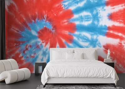 close up shot of red, white and light blue color tie dye fabric texture background in square ratio Wall mural