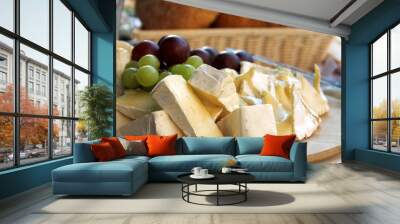 brie cheese on cutting board Wall mural