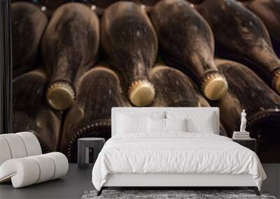 Interior of cellar with bottles of old bottles of champagne Wall mural