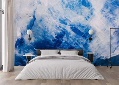 Blue ice texture. Abstract arctic winter background. Wall mural