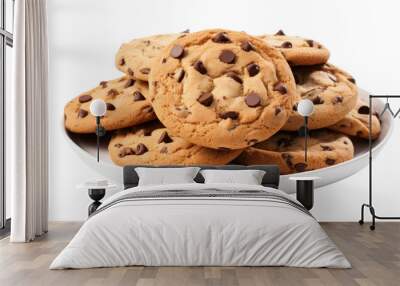 A plate holds freshly baked chocolate chip cookies against a white background Wall mural