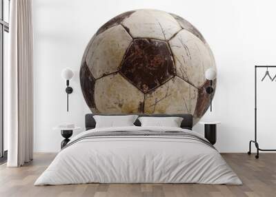 An old, brown, and white soccer ball with visible wear and tear Wall mural