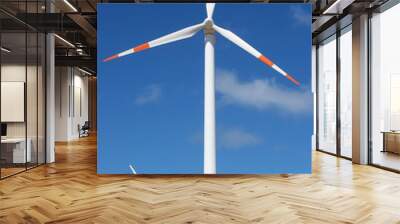 two wind mill power generators against blue sky Wall mural