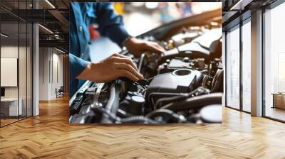 Car mechanic working on a car engine factory Wall mural