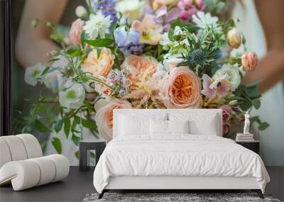 Spring wedding bouquet with pastel flowers and bits of greenery for a touch of natural elegance. Wall mural