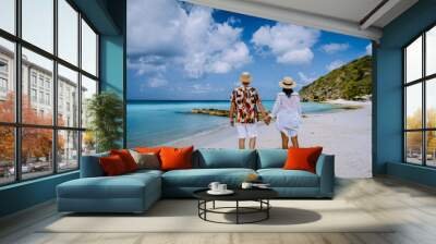  Cas Abou Beach Curacao on the caribbean island of Curacao, Playa Cas Abou in Curacao Caribbean tropical white beach with blue ocean men and woman on the beach, couple mid age on vacation Wall mural