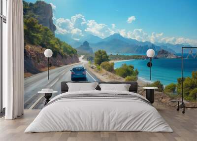 car driving on the road of Europe. road landscape in summer. it's nice to drive on the beachside highway. in Europe, summer road trip on a ocean beach road Wall mural