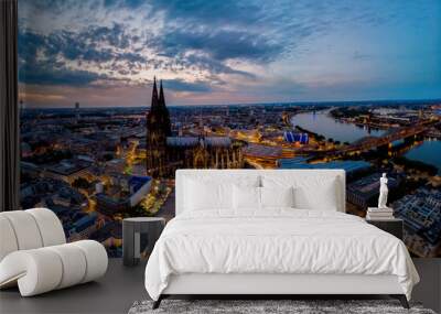 Colgne Koln Cathedral during sunset , drone aerial vie over Cologne and the river rhein during sunset in Germany Europe dusk Wall mural