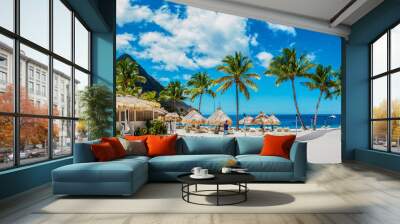 Sugar beach Saint Lucia , a public white tropical beach with palm trees and luxury beach chairs on the beach of the Island St Lucia Caribbean Wall mural