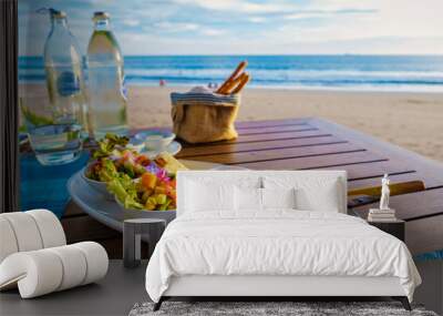 Thai food on a table on the beach in Thailand. table with Thai food Thai sate Wall mural