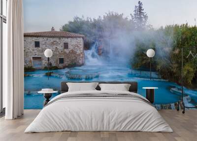 Toscane Italy, natural spa with waterfalls and hot springs at Saturnia thermal baths, Grosseto, Tuscany, Italy aerial view on the Natural thermal waterfalls couple at vacation at Saturnia Toscany Wall mural