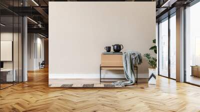 Interior design of living room at scandinavian apartment with stylish commode, tropical plants, books, tea pot and elegant accessories. Modern home decor. Template. Copy space. Beige walls. Wall mural