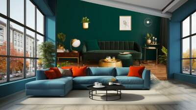 Luxury living room in house with modern interior design, green velvet sofa, coffee table, pouf, gold decoration, plant, commode, carpet, mock up poster frame and elegant accessories. Template. Wall mural