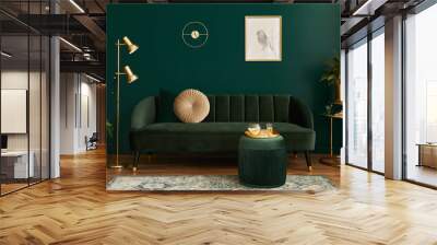 Luxury living room in house with modern interior design, green velvet sofa, coffee table, pouf, gold decoration, plant, lamp, carpet, mock up poster frame and elegant accessories. Template. Wall mural