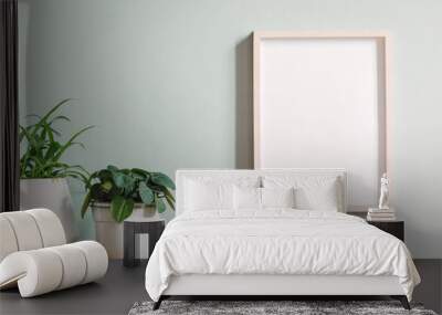 Minimalistic room interior with mock up photo frame on the brown wooden table with beautiful plant in design hipster white pot. Grey walls. Stylish and floral concept of mock up poster frame.  Wall mural