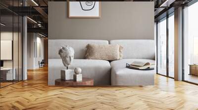 Stylish interior with design neutral modular sofa, mock up poster frames, coffee tables, wooden tray, book, decoration, slippers and elegant personal accessories in modern home decor. Template. Wall mural