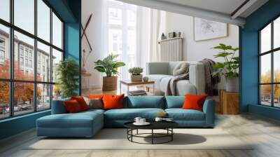 stylish scandinavian living room with design mint sofa, furnitures, mock up poster map, plants and e Wall mural