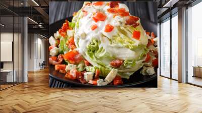 delicious Classic Wedge Salad covered in a tasty blue cheese dressing, crunchy bacon, and fresh tomatoes closeup on a plate. horizontal  Wall mural