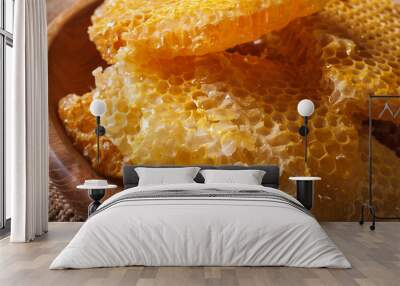 Fresh golden honeycomb on wooden plate macro. horizontal
 Wall mural