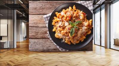 gomiti pasta with white beans and cheese on a plate close-up. Horizontal top view
 Wall mural