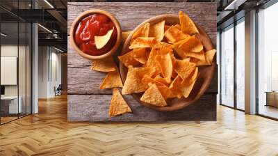 Nachos corn chips with spicy sauce. Horizontal top view
 Wall mural