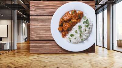 Rice with chicken in curry sauce top view Wall mural