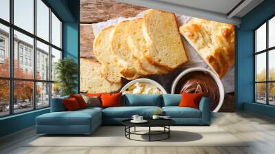 sliced brioche bread and mascarpone cheese and chocolate cream close-up. horizontal top view Wall mural